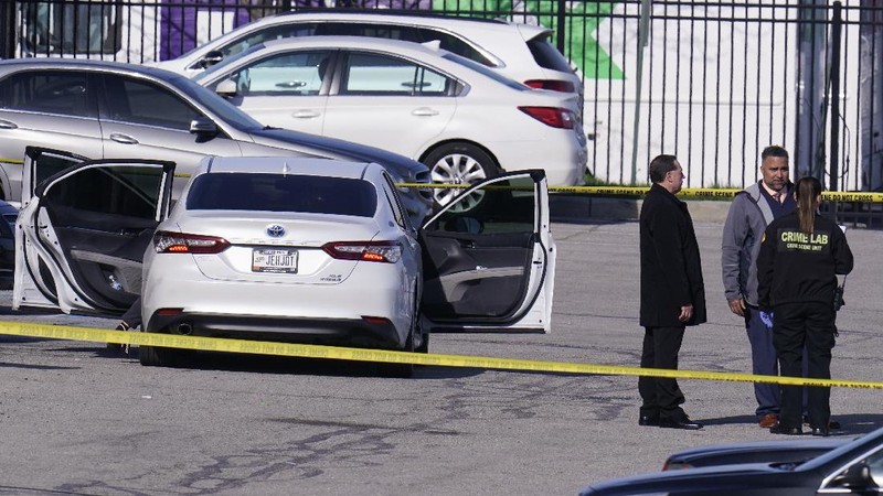 Police arrive at the scene where multiple people were reportedly shot at the FedEx Ground facility early Friday, April 16, 2021, in Indianapolis, Indiana. Multiple people were shot and killed in a late-night shooting at a FedEx facility in Indianapolis, and the shooter killed himself, police said. (Mykal McEldowney/The Indianapolis Star via AP)