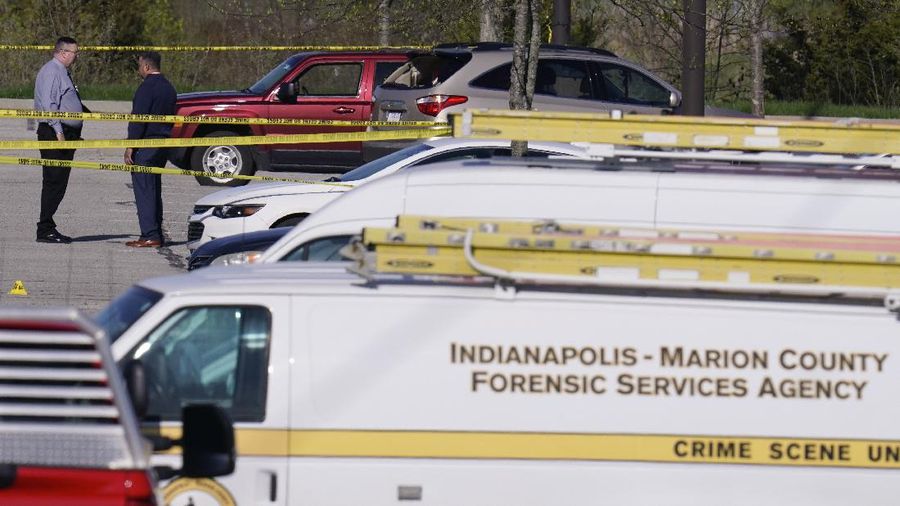 Police arrive at the scene where multiple people were reportedly shot at the FedEx Ground facility early Friday, April 16, 2021, in Indianapolis, Indiana. Multiple people were shot and killed in a late-night shooting at a FedEx facility in Indianapolis, and the shooter killed himself, police said. (Mykal McEldowney/The Indianapolis Star via AP)