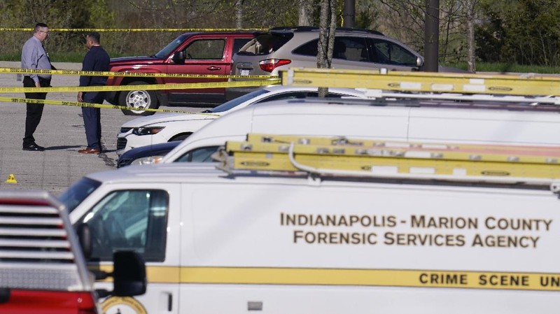 Police arrive at the scene where multiple people were reportedly shot at the FedEx Ground facility early Friday, April 16, 2021, in Indianapolis, Indiana. Multiple people were shot and killed in a late-night shooting at a FedEx facility in Indianapolis, and the shooter killed himself, police said. (Mykal McEldowney/The Indianapolis Star via AP)