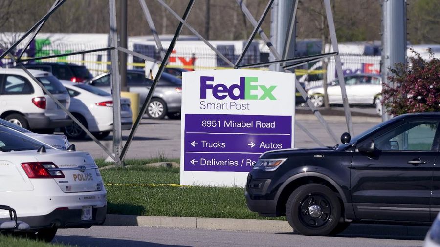 Police arrive at the scene where multiple people were reportedly shot at the FedEx Ground facility early Friday, April 16, 2021, in Indianapolis, Indiana. Multiple people were shot and killed in a late-night shooting at a FedEx facility in Indianapolis, and the shooter killed himself, police said. (Mykal McEldowney/The Indianapolis Star via AP)