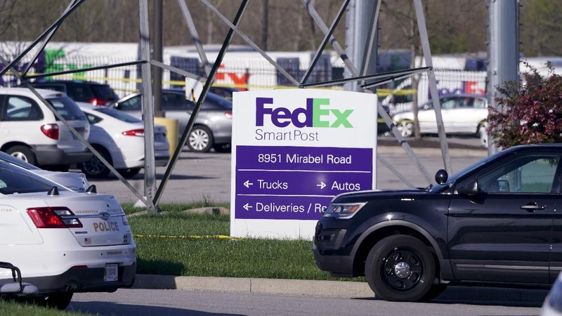 Police arrive at the scene where multiple people were reportedly shot at the FedEx Ground facility early Friday, April 16, 2021, in Indianapolis, Indiana. Multiple people were shot and killed in a late-night shooting at a FedEx facility in Indianapolis, and the shooter killed himself, police said. (Mykal McEldowney/The Indianapolis Star via AP)