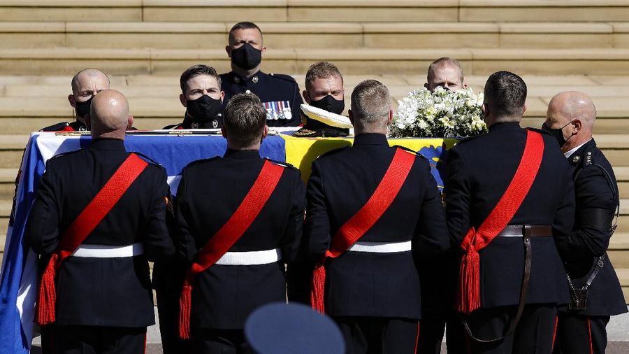 The coffin arrives at St George's Chapel for the funeral of Britain's Prince Philip inside Windsor Castle in Windsor, England, Saturday, April 17, 2021. Prince Philip died April 9 at the age of 99 after 73 years of marriage to Britain's Queen Elizabeth II. (Justin Tallis/Pool via AP)