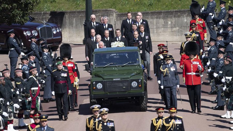 The coffin arrives at St George's Chapel for the funeral of Britain's Prince Philip inside Windsor Castle in Windsor, England, Saturday, April 17, 2021. Prince Philip died April 9 at the age of 99 after 73 years of marriage to Britain's Queen Elizabeth II. (Justin Tallis/Pool via AP)
