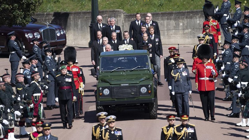 The coffin arrives at St George's Chapel for the funeral of Britain's Prince Philip inside Windsor Castle in Windsor, England, Saturday, April 17, 2021. Prince Philip died April 9 at the age of 99 after 73 years of marriage to Britain's Queen Elizabeth II. (Justin Tallis/Pool via AP)