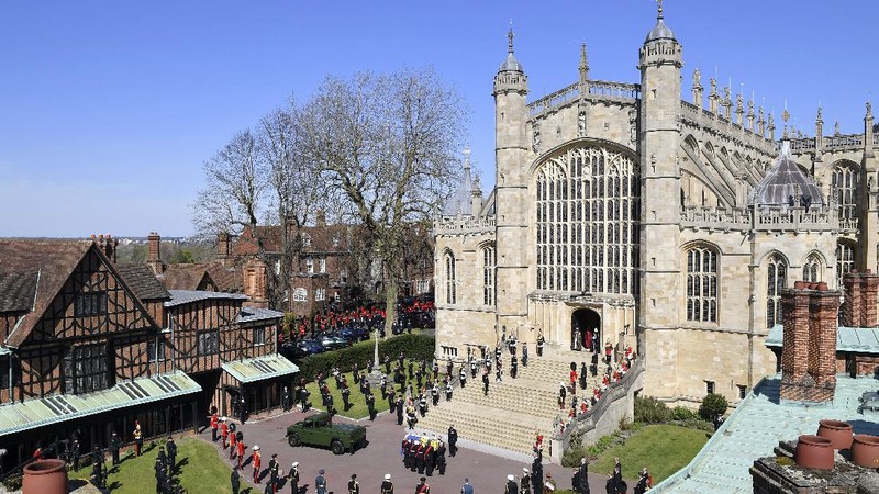 The coffin arrives at St George's Chapel for the funeral of Britain's Prince Philip inside Windsor Castle in Windsor, England, Saturday, April 17, 2021. Prince Philip died April 9 at the age of 99 after 73 years of marriage to Britain's Queen Elizabeth II. (Justin Tallis/Pool via AP)