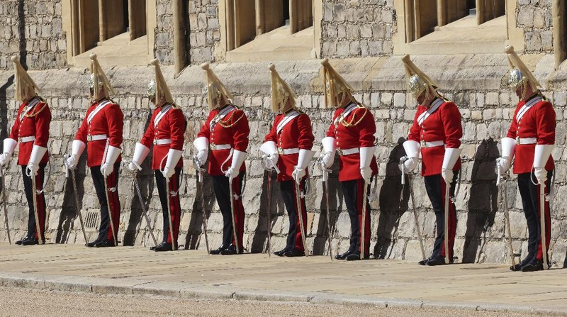 The coffin arrives at St George's Chapel for the funeral of Britain's Prince Philip inside Windsor Castle in Windsor, England, Saturday, April 17, 2021. Prince Philip died April 9 at the age of 99 after 73 years of marriage to Britain's Queen Elizabeth II. (Justin Tallis/Pool via AP)