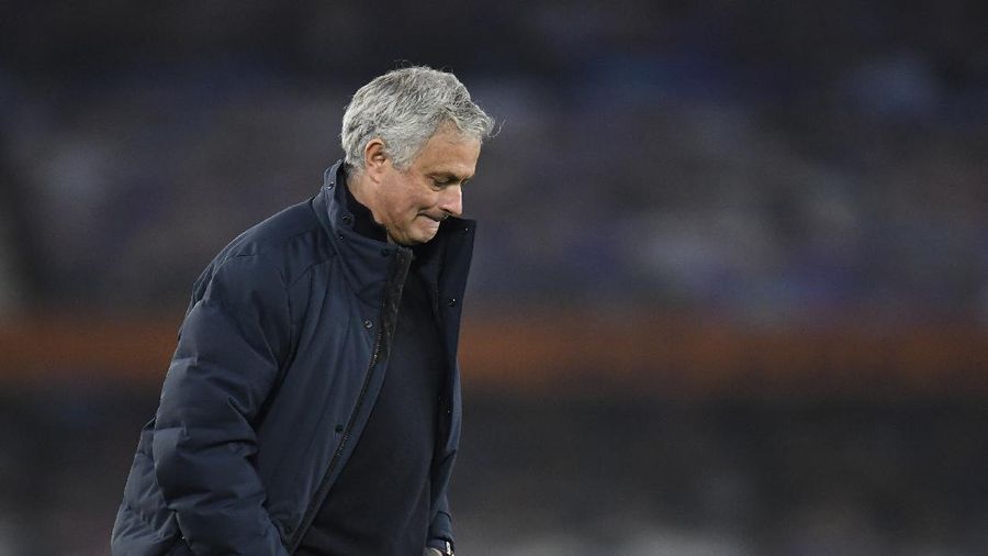 Tottenham's manager Jose Mourinho walks on the pitch at the end of the English Premier League soccer match between Everton and Tottenham Hotspur at Goodison Park in Liverpool, England, Friday, April 16, 2021. (Peter Powell/Pool via AP)