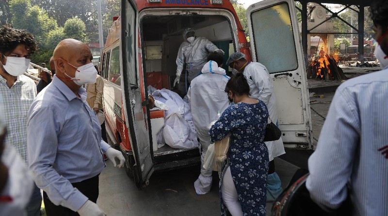 A street is seen deserted during weekend lockdown in Mumbai, India, Saturday, April 10, 2021. India has been overwhelmed by hundreds of thousands of new coronavirus cases daily, bringing pain, fear and agony to many lives as lockdowns have been placed in Delhi and other cities around the country. (AP Photo/Rajanish Kakade)