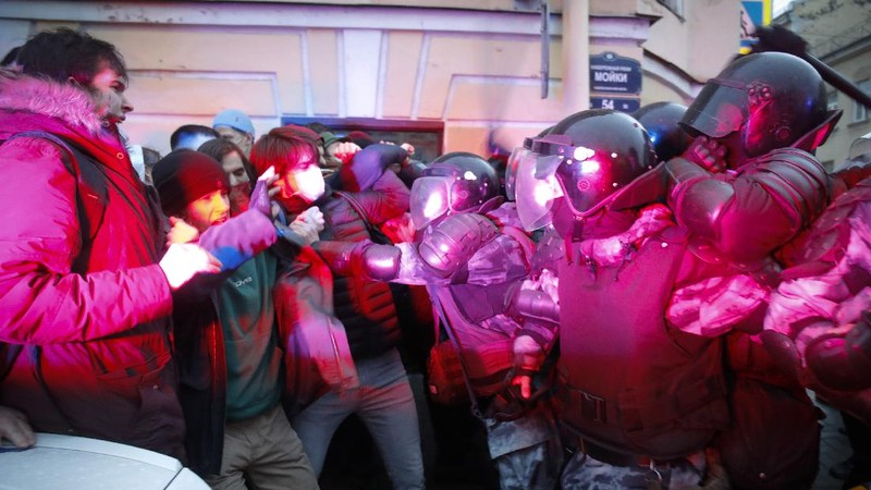 A woman argues with police officer during a protest in support of jailed opposition leader Alexei Navalny in Ulan-Ude, the regional capital of Buryatia, a region near the Russia-Mongolia border, Russia, Wednesday, April 21, 2021. Navalny's team has called for nationwide protests on Wednesday following reports that the politician's health was deteriorating in prison, where he has been on hunger strike since March 31. Russian authorities have stressed that the demonstrations were not authorized and warned against participating in them. (AP Photo/Anna Ogorodnik)