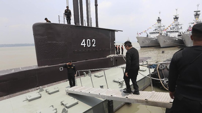 Indonesian Navy submarine KRI Nanggala sails in the waters off Tuban, East Java, Indonesia, as seen in this aerial photo taken from Indonesian Navy helicopter of 400 Air Squadron, in this Monday, Oct. 6, 2014 photo. Indonesia's navy is searching for the submarine that went missing north of the resort island of Bali with a number of people on board, the military said Wednesday. (AP Photo/Eric Ireng)