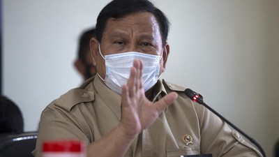 Indonesian Defense Minister Prabowo Subianto talks to media during a press conference regarding a missing navy submarine in Bali, Indonesia,Thursday, April 22, 2021. Indonesia's navy ships are intensely searching the waters where one of its submarines was last detected before it disappeared, as neighboring countries are set to join the complex operation. (AP Photo/Firdia Lisnawati)