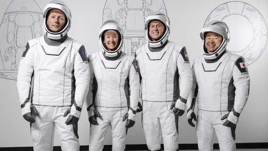 This March 3, 2021 photo made available by SpaceX shows mission specialist Thomas Pesquet of the European Space Agency, pilot Megan McArthur and commander Shane Kimbrough of NASA, and mission specialist Akihiko Hoshide of the Japan Aerospace Exploration Agency, the crew for its third astronaut launch to the International Space Station, at the SpaceX training facility in Hawthorne, Calif. (SpaceX via AP)