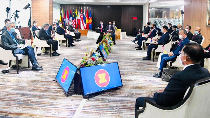 In this photo released by Indonesian Presidential Palace, Indonesian President Joko Widodo, center, delivers his press statement as, from left to right, Foreign Minister Retno Marsudi, Coordinating Minister for Economic Affairs Airlangga Hartarto, and Cabinet Secretary Pramono Anung listen, following ASEAN Leaders' Meeting at the ASEAN Secretariat in Jakarta, Indonesia, Saturday, April 24, 2021. Southeast Asian leaders demanded an immediate end to killings and the release of political detainees in Myanmar in an emergency summit with its top general and coup leader Saturday in the Indonesian capital, Indonesia's president said. (Laily Rachev, Indonesian Presidential Palace via AP)