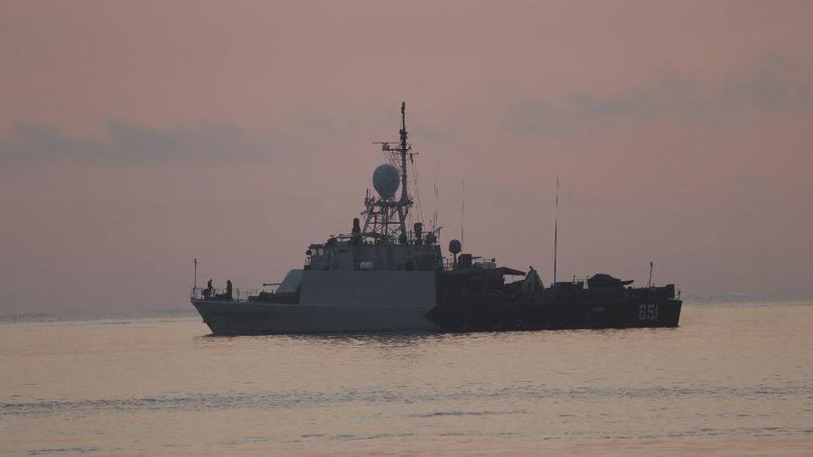 An Indonesian navy patrol ship returns after a search operation for submarine KRI Nanggala that went missing while participating in a training exercise on Wednesday, off Banyuwangi, East Java, Indonesia Sunday, April 25, 2021. Indonesia’s navy on Saturday declared its missing submarine had sunk and cracked open after finding items from the vessel over the past two days, apparently ending hope of finding any of the 53 crew members alive. (AP Photo/Achmad Ibrahim)