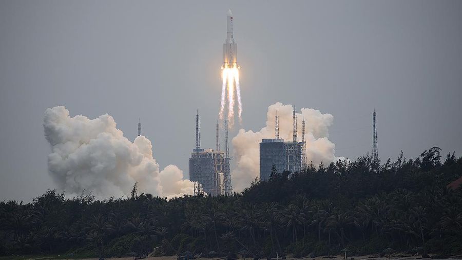 A Long March 5B rocket carrying a module for a Chinese space station lifts off from the Wenchang Spacecraft Launch Site in Wenchang in southern China's Hainan Province, Thursday, April 29, 2021. China has launched the core module on Thursday for its first permanent space station that will host astronauts long-term. (Chinatopix via AP)