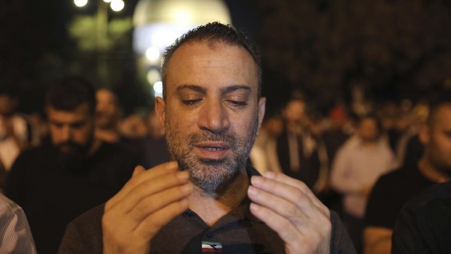Palestinian Muslim worshippers pray during the Laylat al-Qadr, or the night of destiny, in the holy fasting month of Ramadan, in front of the Dome of the Rock Mosque at the Al Aqsa Mosque compound in Jerusalem's Old City Saturday, May 8, 2021. (AP Photo/Mahmoud Illean)