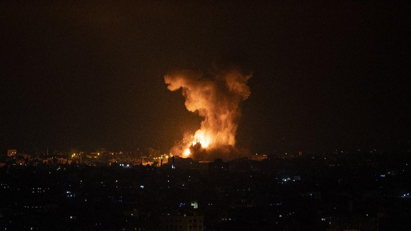 Rockets are launched from the Gaza Strip towards Israel, Monday, May. 10, 2021. Hamas militants fired dozens of rockets into Israel on Monday, including a barrage that set off air raid sirens as far away as Jerusalem, after hundreds of Palestinians were hurt in clashes with Israeli police at a flashpoint religious site in the contested holy city. (AP Photo/Khalil Hamra)