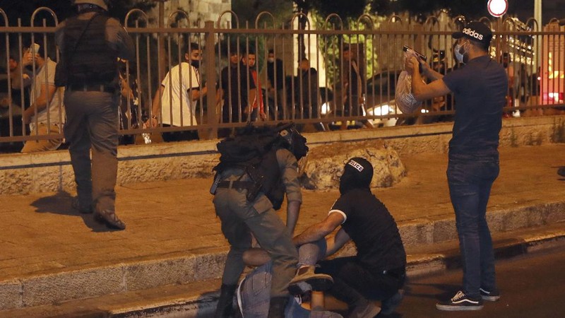 Rockets are launched from the Gaza Strip towards Israel, Monday, May. 10, 2021. Hamas militants fired dozens of rockets into Israel on Monday, including a barrage that set off air raid sirens as far away as Jerusalem, after hundreds of Palestinians were hurt in clashes with Israeli police at a flashpoint religious site in the contested holy city. (AP Photo/Khalil Hamra)
