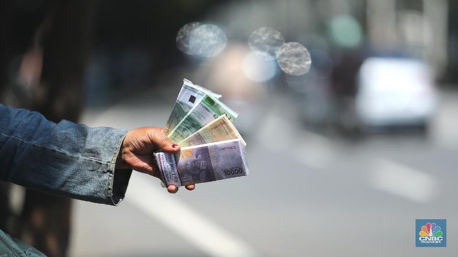 Jelang Lebaran, Penukaran Uang Pecahan  Rupiah Kecil Baru Mulai Ramai (վ/Tri Susilo)