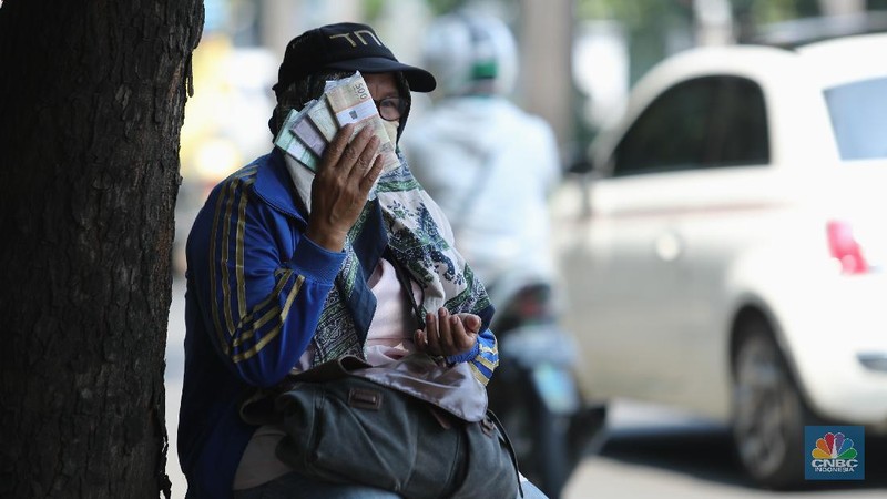 Jelang Lebaran, Penukaran Uang Pecahan  Rupiah Kecil Baru Mulai Ramai (CNBC Indonesia/Tri Susilo)