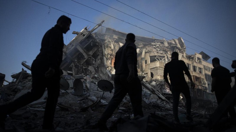 An Israeli artillery unit fires toward targets in Gaza Strip, at the Israeli Gaza border, Thursday, May 13, 2021. (AP Photo/Ariel Schalit)