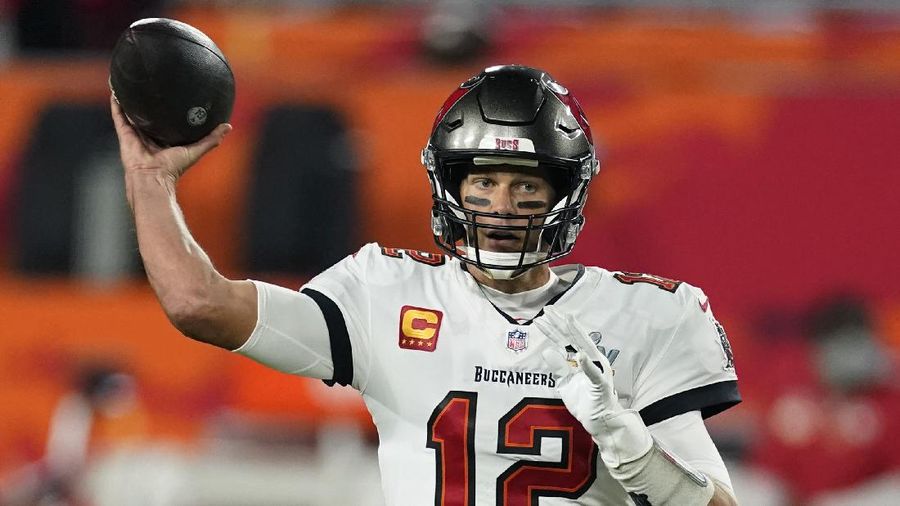 FILE - Tampa Bay Buccaneers quarterback Tom Brady throws against the Kansas City Chiefs during the first half of the NFL Super Bowl 55 football game in Tampa, Fla., in this Sunday, Feb. 7, 2021, file photo. The NFL is returning to London in October and Tom Brady begins his pursuit of an eighth Super Bowl title against Dak Prescott and the Dallas Cowboys when Tampa Bay hosts the league’s annual kickoff game on Sept. 9. (AP Photo/Ashley Landis, File)