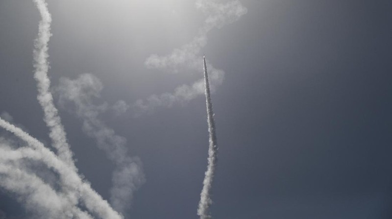An Israeli Iron Dome air defense system launches to intercept rockets fired from Gaza Strip, in Ashkelon, southern Israel, Tuesday, May 11, 2021. (AP Photo/Ariel Schalit)