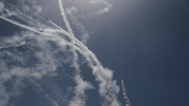 An Israeli Iron Dome air defense system launches to intercept rockets fired from Gaza Strip, in Ashkelon, southern Israel, Tuesday, May 11, 2021. (AP Photo/Ariel Schalit)