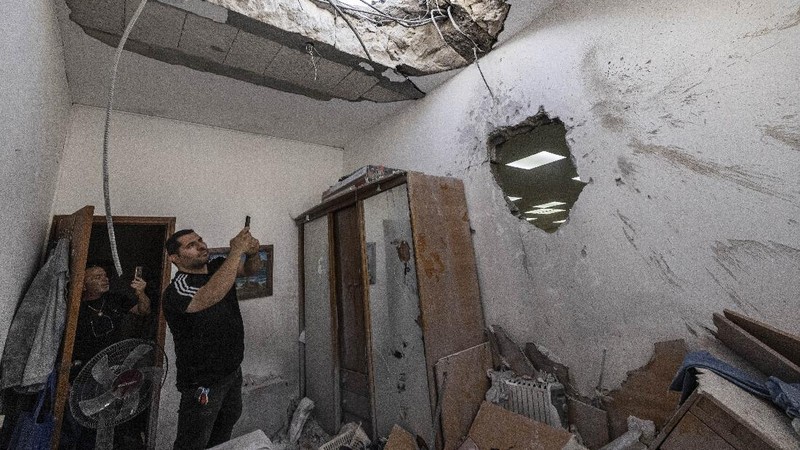 Rockets are launched from Gaza Strip to Israel, Thursday, May 13, 2021. Israeli airstrikes killed multiple senior Hamas military figures Wednesday and toppled a pair of high-rise towers housing Hamas facilities. (AP Photo/Hatem Moussa)