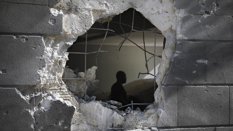 Rockets are launched from Gaza Strip to Israel, Thursday, May 13, 2021. Israeli airstrikes killed multiple senior Hamas military figures Wednesday and toppled a pair of high-rise towers housing Hamas facilities. (AP Photo/Hatem Moussa)