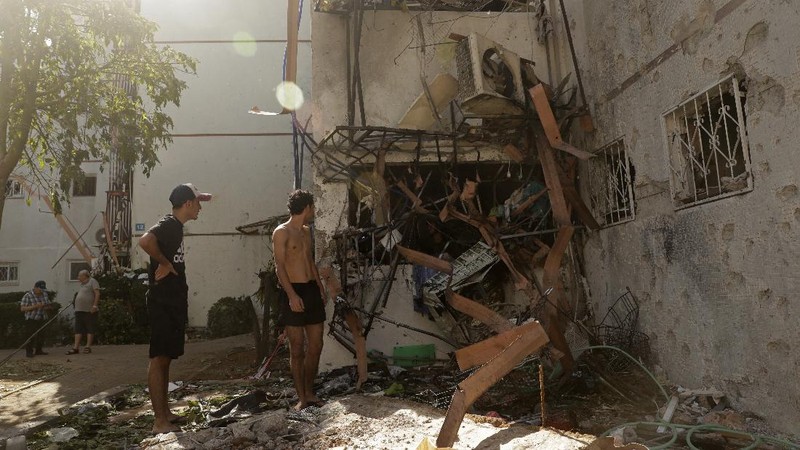 Rockets are launched from Gaza Strip to Israel, Thursday, May 13, 2021. Israeli airstrikes killed multiple senior Hamas military figures Wednesday and toppled a pair of high-rise towers housing Hamas facilities. (AP Photo/Hatem Moussa)