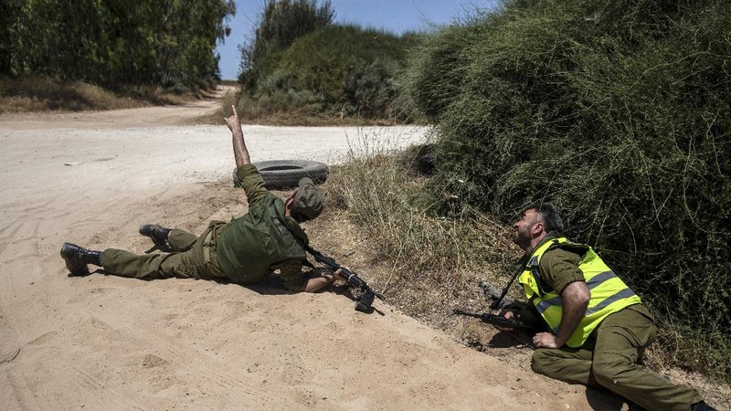Rockets are launched from Gaza Strip to Israel, Thursday, May 13, 2021. Israeli airstrikes killed multiple senior Hamas military figures Wednesday and toppled a pair of high-rise towers housing Hamas facilities. (AP Photo/Hatem Moussa)