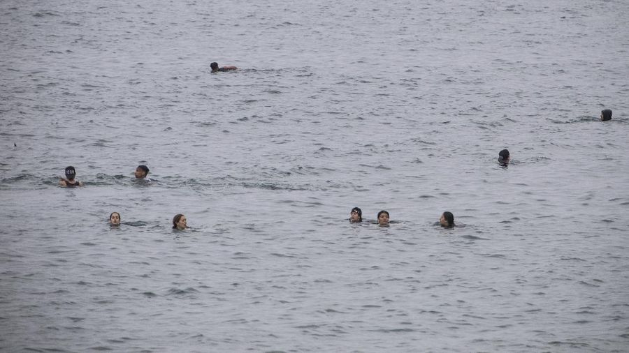 A migrant is rescued by a Spanish Civil guard boat near the border of Morocco and Spain, on Tuesday, May 18, 2021. Spain deployed its military to the Moroccan border Tuesday as thousands of migrants jumped fences or swam onto European soil for the second day in a row after Rabat loosened border controls amid a deepening diplomatic spat. Morocco's loosened border watch came after Spain decided to grant entry for medical treatment to the chief of a militant group that fights for the independence of Western Sahara. Morocco annexed the sprawling region on the west coast of Africa in 1975. (AP Photo/Bernat Armangue)