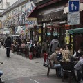 Customers drink beers at cafe terraces in Paris, Wednesday, May, 19, 2021. It's a grand day for the French. Cafe and restaurant terraces reopened Wednesday after a six-month coronavirus shutdown deprived residents of the essence of French "joie de vi
