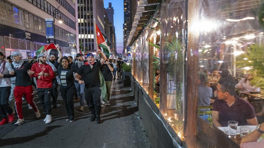 Supporters of the Palestinians march in New York Thursday, May 20, 2021. Israel and Hamas announced a cease-fire, ending a bruising 11-day war that caused widespread destruction in the Gaza Strip and brought life in much of Israel to a standstill. (AP Photo/Craig Ruttle)