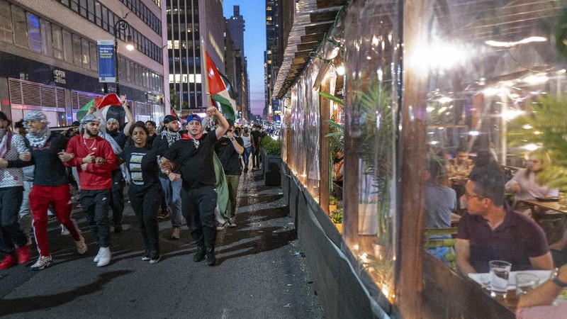 Supporters of the Palestinians march in New York Thursday, May 20, 2021. Israel and Hamas announced a cease-fire, ending a bruising 11-day war that caused widespread destruction in the Gaza Strip and brought life in much of Israel to a standstill. (AP Photo/Craig Ruttle)