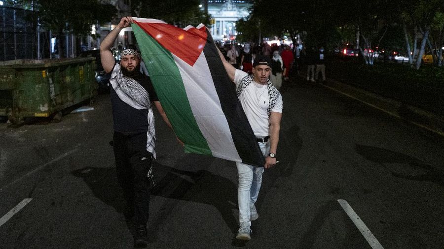 Supporters of the Palestinians march in New York Thursday, May 20, 2021. Israel and Hamas announced a cease-fire, ending a bruising 11-day war that caused widespread destruction in the Gaza Strip and brought life in much of Israel to a standstill. (AP Photo/Craig Ruttle)