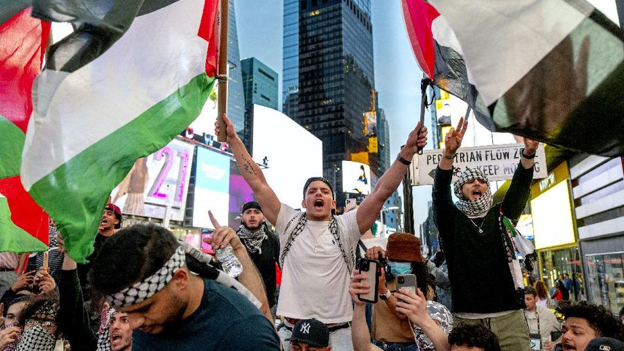 Supporters of the Palestinians march in New York Thursday, May 20, 2021. Israel and Hamas announced a cease-fire, ending a bruising 11-day war that caused widespread destruction in the Gaza Strip and brought life in much of Israel to a standstill. (AP Photo/Craig Ruttle)