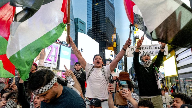 Supporters of the Palestinians march in New York Thursday, May 20, 2021. Israel and Hamas announced a cease-fire, ending a bruising 11-day war that caused widespread destruction in the Gaza Strip and brought life in much of Israel to a standstill. (AP Photo/Craig Ruttle)