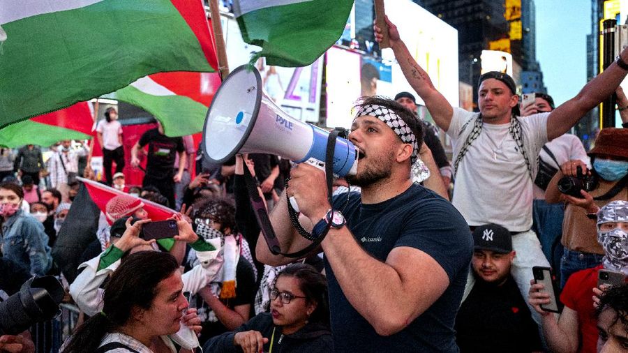 Supporters of the Palestinians march in New York Thursday, May 20, 2021. Israel and Hamas announced a cease-fire, ending a bruising 11-day war that caused widespread destruction in the Gaza Strip and brought life in much of Israel to a standstill. (AP Photo/Craig Ruttle)