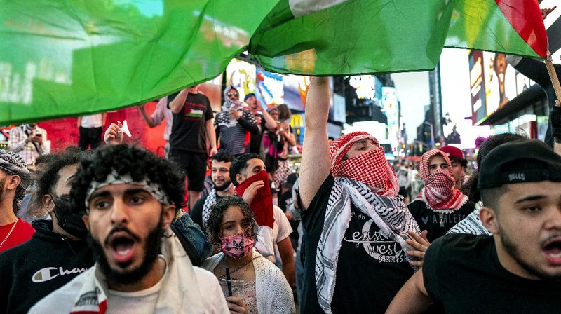 Supporters of the Palestinians march in New York Thursday, May 20, 2021. Israel and Hamas announced a cease-fire, ending a bruising 11-day war that caused widespread destruction in the Gaza Strip and brought life in much of Israel to a standstill. (AP Photo/Craig Ruttle)