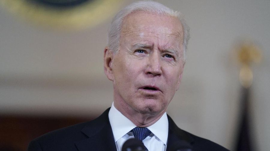 President Joe Biden speaks about a cease-fire between Israel and Hamas, in the Cross Hall of the White House, Thursday, May 20, 2021, in Washington. (AP Photo/Evan Vucci)