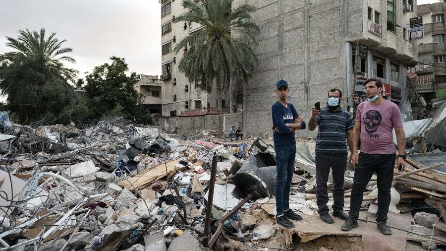 Kesepakatan gencatan senjata mengakhiri aksi saling serang anåtara Israel dan Palestina di jalur Gaza. (AP/John Minchillo)