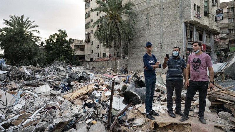 Kesepakatan gencatan senjata mengakhiri aksi saling serang anåtara Israel dan Palestina di jalur Gaza. (AP/John Minchillo)