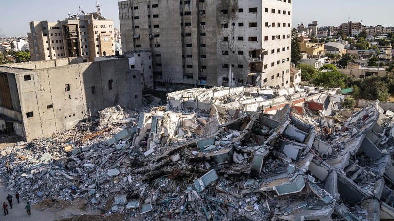 Kesepakatan gencatan senjata mengakhiri aksi saling serang anåtara Israel dan Palestina di jalur Gaza. (AP/John Minchillo)