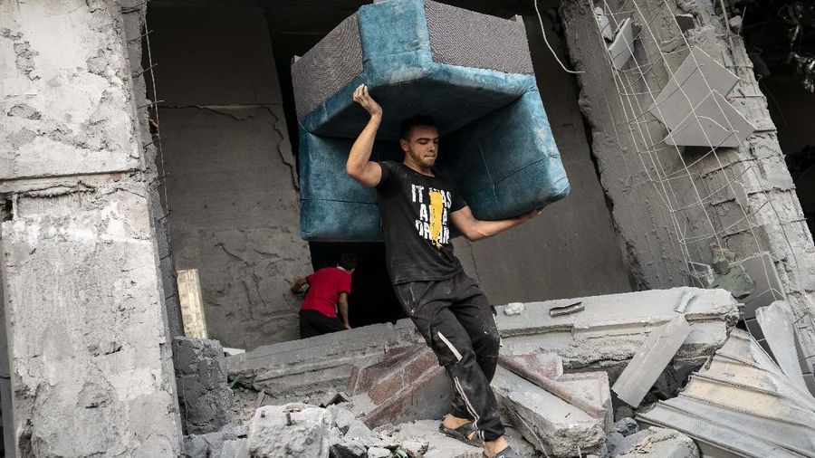 Kesepakatan gencatan senjata mengakhiri aksi saling serang anåtara Israel dan Palestina di jalur Gaza. (AP/John Minchillo)
