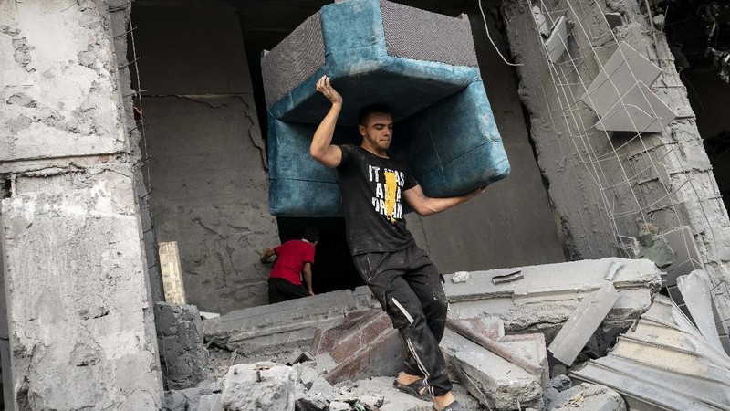 Kesepakatan gencatan senjata mengakhiri aksi saling serang anåtara Israel dan Palestina di jalur Gaza. (AP/John Minchillo)
