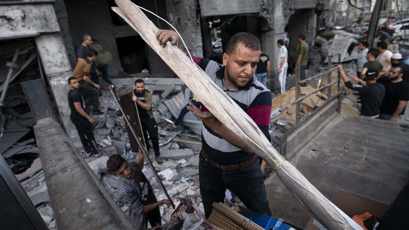 Kesepakatan gencatan senjata mengakhiri aksi saling serang anåtara Israel dan Palestina di jalur Gaza. (AP/John Minchillo)
