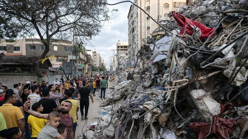 Kesepakatan gencatan senjata mengakhiri aksi saling serang anåtara Israel dan Palestina di jalur Gaza. (AP/John Minchillo)