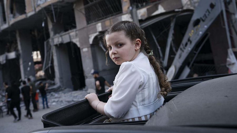 Kesepakatan gencatan senjata mengakhiri aksi saling serang anåtara Israel dan Palestina di jalur Gaza. (AP/John Minchillo)
